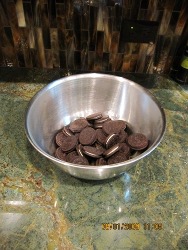 How to Make White Chocolate Oreo Bark - In a large bowl, crush the Oreos into little pieces. This can easily be done by hand.